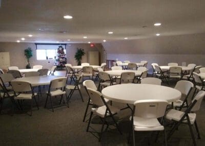 Function room with tables and chairs set up
